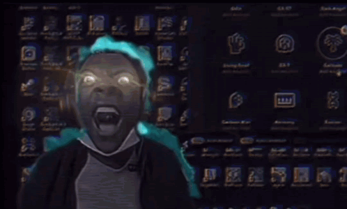 A Man Wearing Headphones Is Screaming In Front Of A Computer Screen With Lightning Coming Out Of It GIF