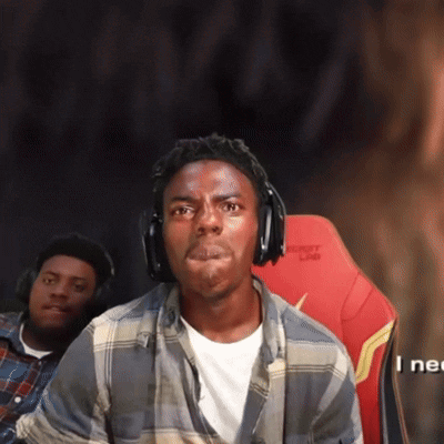 A Man Wearing Headphones Is Sitting In A Red Chair With The Word Drift On The Back GIF