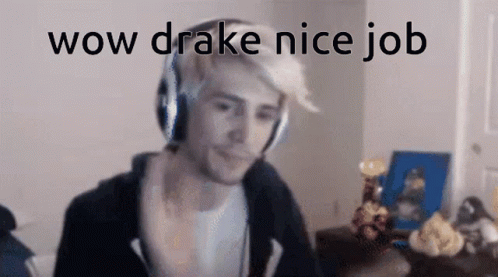 A Man Wearing Headphones Is Sitting In Front Of A Computer Screen And Says Wow Drake Nice Job . GIF