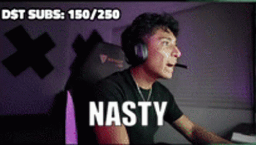 A Man Wearing Headphones Is Sitting In Front Of A Computer Screen With The Words Nasty Written On The Bottom GIF