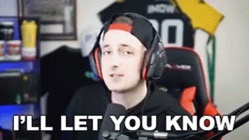 A Man Wearing Headphones Is Sitting In Front Of A Microphone And Saying `` I 'Ll Let You Know '' GIF