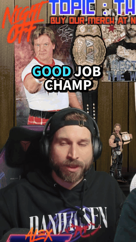 A Man Wearing Headphones Is Sitting In Front Of A Poster That Says " Good Job Champ " GIF