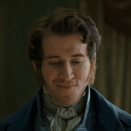 A Man Wearing Headphones Is Smiling With The Words " Eddy Eliminated Ishows " In The Background GIF