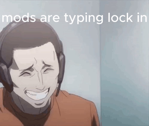 A Man Wearing Headphones Is Smiling With The Words Mods Are Typing Lock In GIF