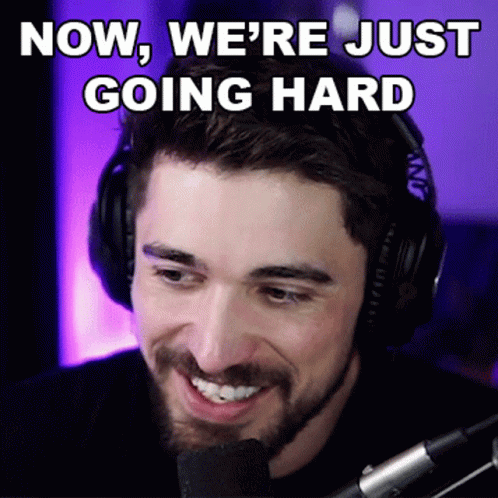 A Man Wearing Headphones Is Smiling With The Words Now We 'Re Just Going Hard Above Him GIF