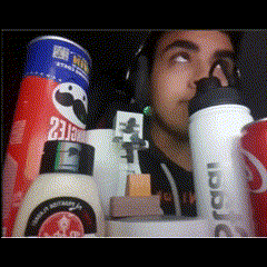 A Man Wearing Headphones Is Surrounded By Condiments Including Pringles Mayonnaise And A Coke Can GIF