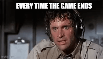 A Man Wearing Headphones Is Sweating And Making A Face . GIF