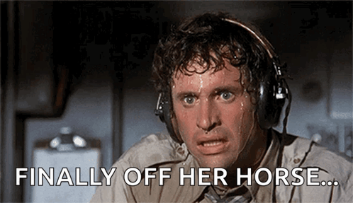 A Man Wearing Headphones Is Sweating And Says Finally Off Her Horse ... GIF