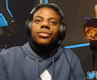 A Man Wearing Headphones Looks At The Camera With A Twitter Logo Behind Him GIF