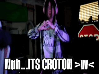 A Man Wearing Headphones Making A Heart Shape With His Hands And The Words Nah Its Croton > W < GIF