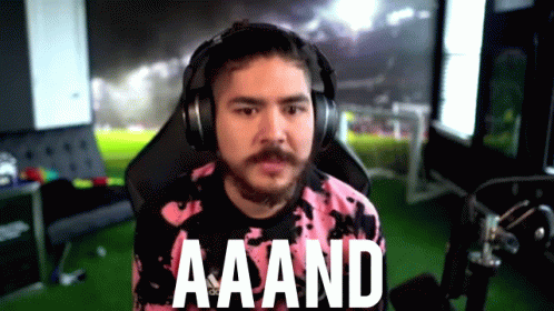 A Man Wearing Headphones Says Aaand In Front Of A Green Background GIF