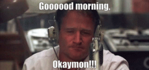 A Man Wearing Headphones Says Good Morning Okaymon !!! GIF