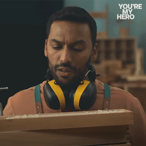 A Man Wearing Headphones Says I Didn 'T See You There GIF