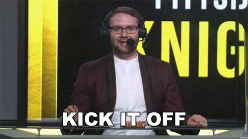 A Man Wearing Headphones Says Kick It Off In Front Of A King Sign GIF