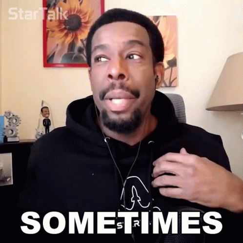 A Man Wearing Headphones Says " Sometimes " In Front Of A Picture Of A Sunflower GIF