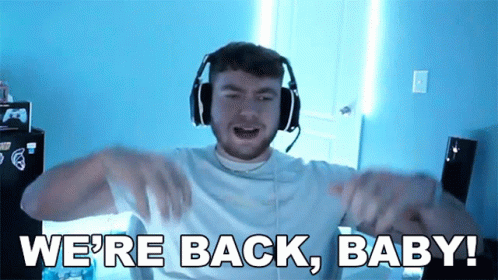 Man With Headphones Saying We're Back Baby GIF