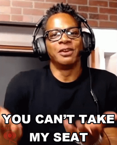A Man Wearing Headphones Says " You Can T Take My Seat " GIF