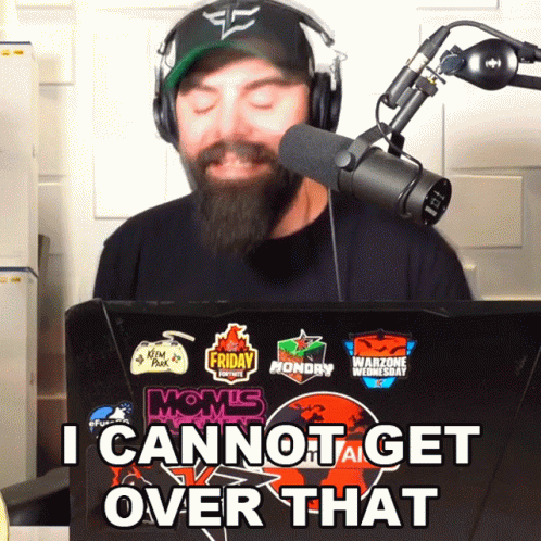 A Man Wearing Headphones Stands In Front Of A Laptop That Says I Cannot Get Over That On It GIF