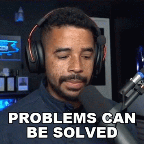 Man With Headphones In Front Of Microphone Saying Problems Can Be Solved GIF