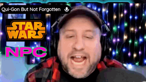 A Man Wearing Headphones Stands In Front Of A Sign That Says Star Wars Npc GIF