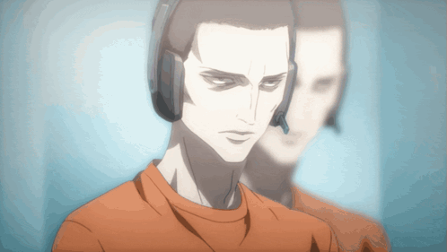 A Man Wearing Headphones Stands In Front Of A Wall GIF