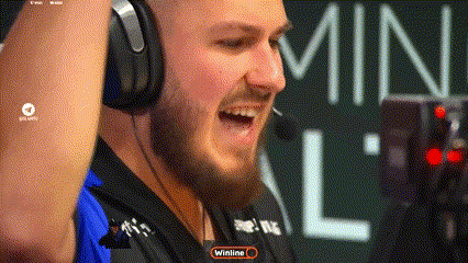 A Man Wearing Headphones With A Winline Logo In The Corner GIF
