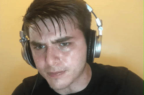 A Man Wearing Headphones With Sweat Coming Out Of His Nose GIF