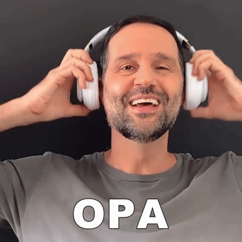 A Man Wearing Headphones With The Word Opa In White Letters GIF