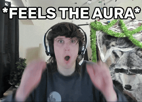 A Man Wearing Headphones With The Words Feels The Aura Written Above Him GIF