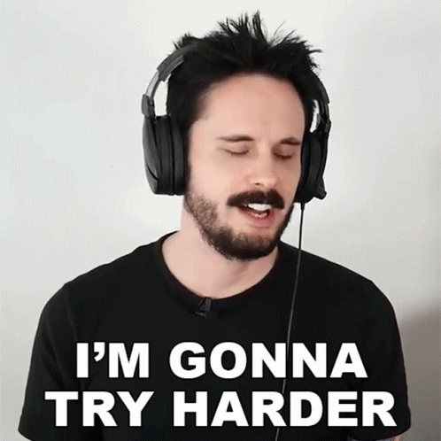 A Man Wearing Headphones With The Words I 'M Gonna Try Harder Below Him GIF