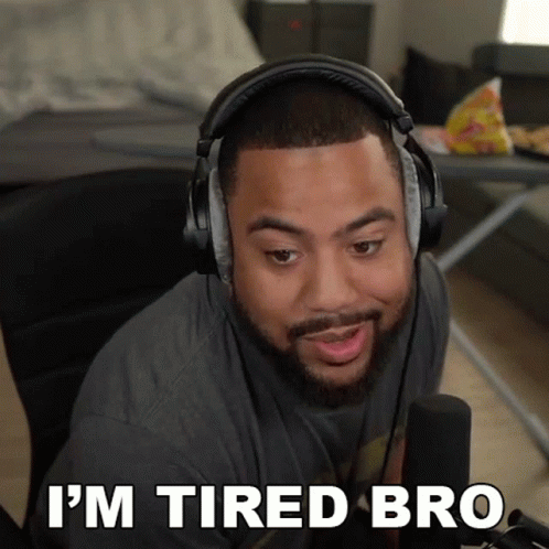 A Man Wearing Headphones With The Words " I 'M Tired Bro " On The Bottom GIF