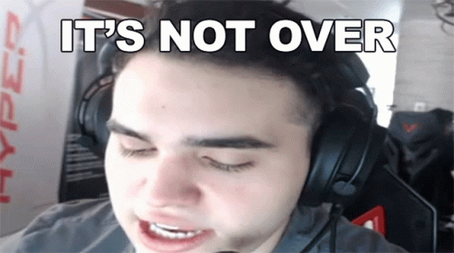 A Man Wearing Headphones With The Words " It 'S Not Over " Above His Head GIF