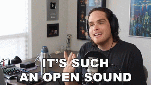 A Man Wearing Headphones With The Words It 'S Such An Open Sound Below Him GIF