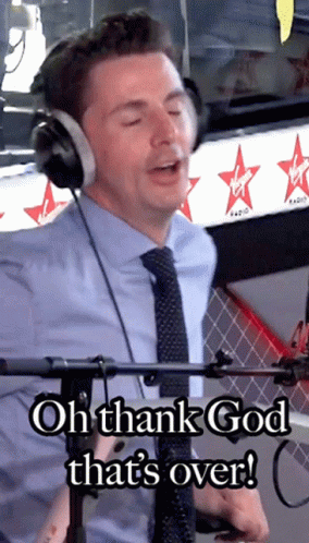 A Man Wearing Headphones With The Words Oh Thank God That 'S Over GIF