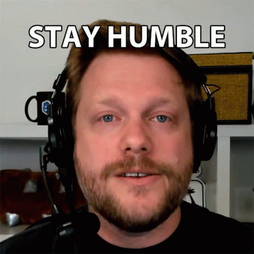 A Man Wearing Headphones With The Words Stay Humble Written Above Him GIF