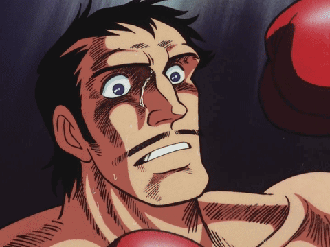 Man With Red Boxing Gloves And Tear GIF