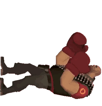 a man wearing red boxing gloves with the letter c on his arm is laying on his back