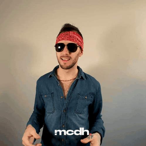 A Man Wearing Sunglasses And A Bandana Has The Word Mcdh On The Bottom GIF