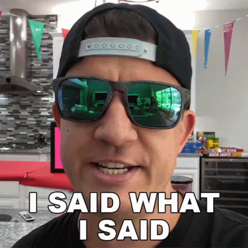 A Man Wearing Sunglasses And A Baseball Cap Says " I Said What I Said " GIF