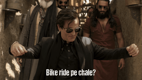 A Man Wearing Sunglasses And A Black Jacket With The Words Bike Ride Pe Chale GIF