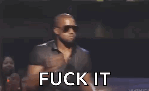 A Man Wearing Sunglasses And A Black Shirt Is Standing In Front Of A Microphone And Saying `` Fuck It '' . GIF