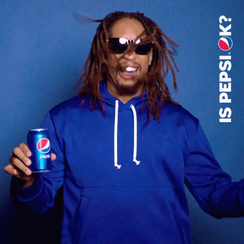 A Man Wearing Sunglasses And A Blue Hoodie Holds A Can Of Pepsi GIF