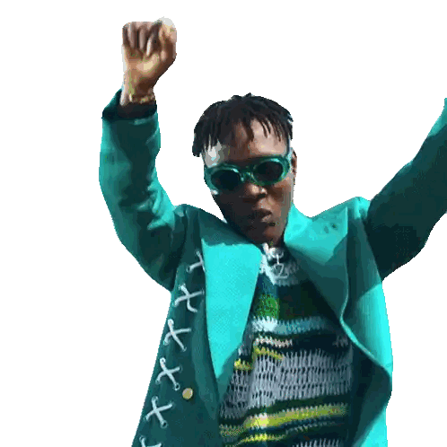 a man wearing sunglasses and a blue jacket has his arms up in the air