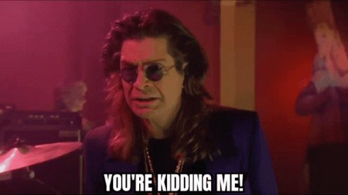 A Man Wearing Sunglasses And A Blue Jacket Says You 'Re Kidding Me GIF
