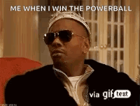 A Man Wearing Sunglasses And A Crown Is Sitting On A Couch With A Gif Text . GIF