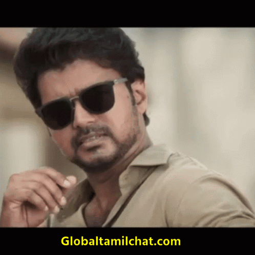 A Man Wearing Sunglasses And A Globaltamilchat.com Logo On The Bottom GIF