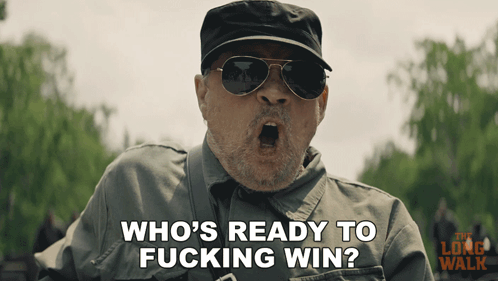 A Man Wearing Sunglasses And A Hat Is Asking Who 'S Ready To Fucking Win GIF
