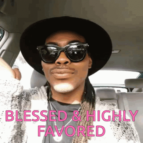 A Man Wearing Sunglasses And A Hat Is Sitting In A Car With The Words Blessed And Highly Favored Written Above Him GIF