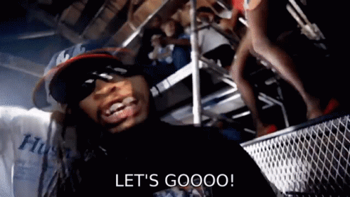 A Man Wearing Sunglasses And A Hat Says Let 'S Gooooo GIF