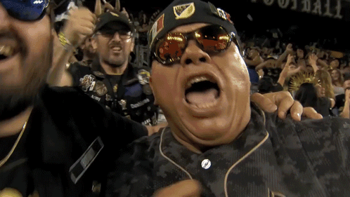 A Man Wearing Sunglasses And A Hat That Says Lafc On It GIF
